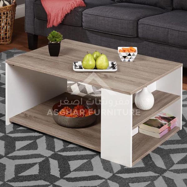 A two-tone rectangular coffee table with a light wood grain finish and white side panels, featuring a lower shelf for storage.