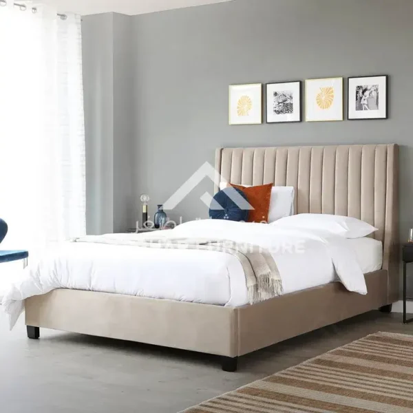 Elegant beige upholstered bed with a tall, vertically paneled headboard.
