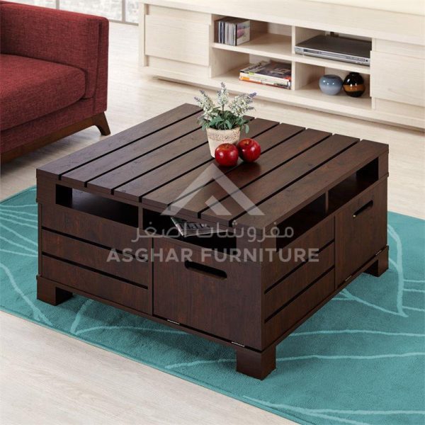 A dark wood slatted square coffee table with storage space on the sides and an open top.