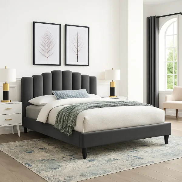 A contemporary grey channel-tufted bed with white bedding, a blue throw, and two framed prints.