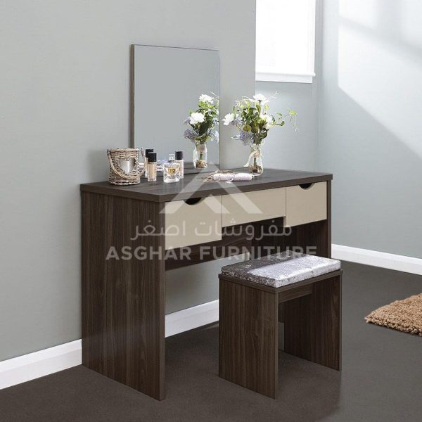 A compact wooden vanity table with two drawers and a mirror, accompanied by a matching stool.