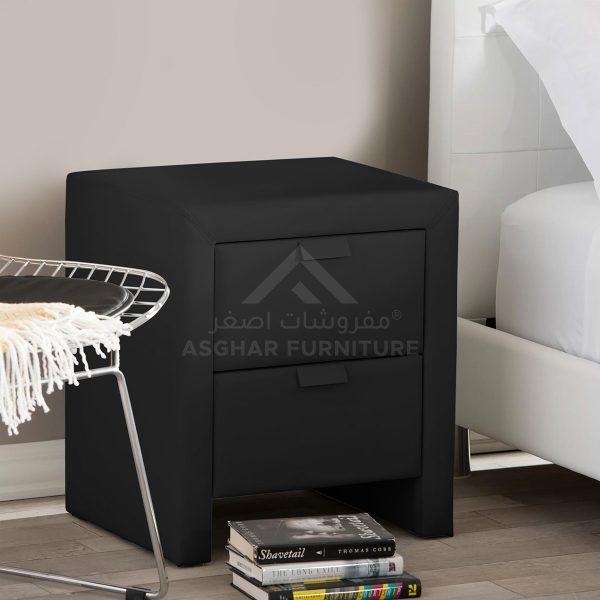 A sleek black nightstand with a leather or faux leather wrap and two drawers with rectangular hardware.