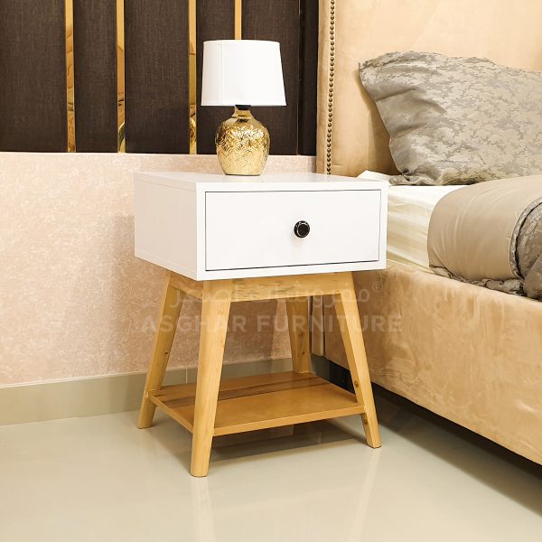 A stylish nightstand with a white top drawer and a wooden base with a shelf.