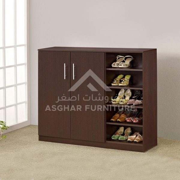 A dark brown shoe cabinet with two doors and open shelving on the right, filled with various shoes.