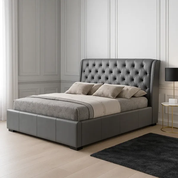A luxurious dark gray leather tufted upholstered bed with a high headboard.