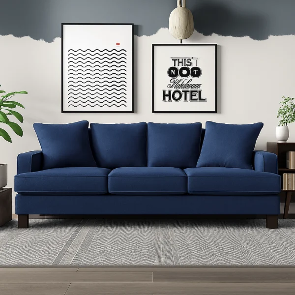 A classic navy blue sofa with three seat cushions and four back cushions. The sofa has squared arms and a clean, traditional design.