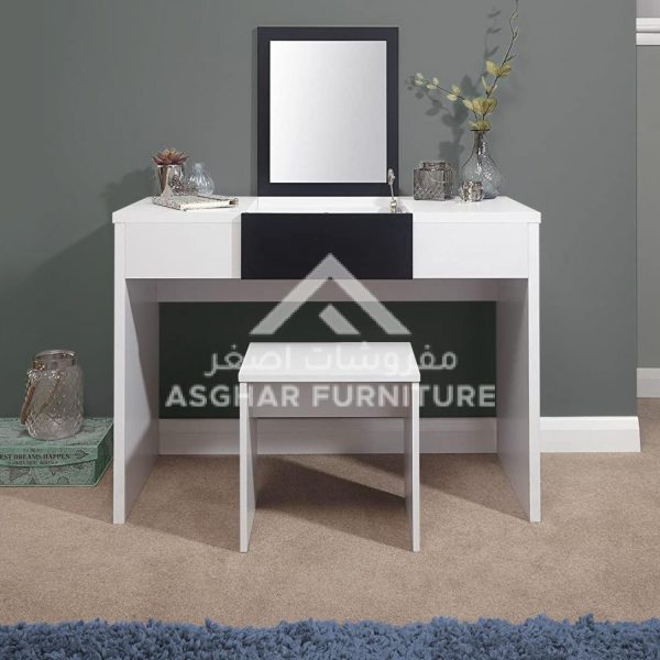 A sleek white and black vanity desk with a central pull-out mirror, a storage compartment, and a matching stool.