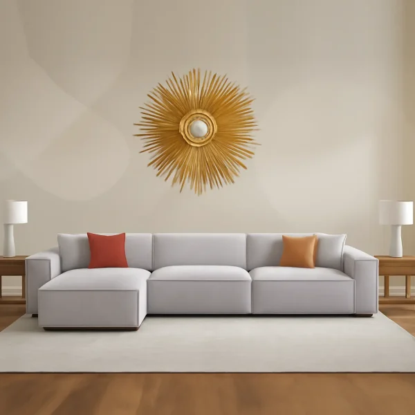 A light gray L-shaped sectional sofa with a chaise lounge. The sofa has a modern, modular design with low arms.