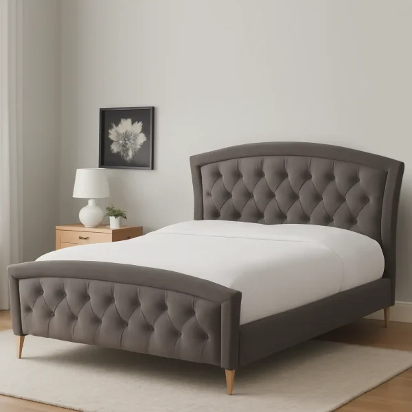 A grey tufted upholstered bed with white bedding, a nightstand, and framed art in a bedroom.