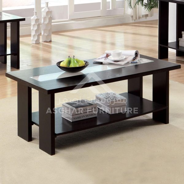 A contemporary rectangular black coffee table with a glass insert on the top and an open lower shelf.
