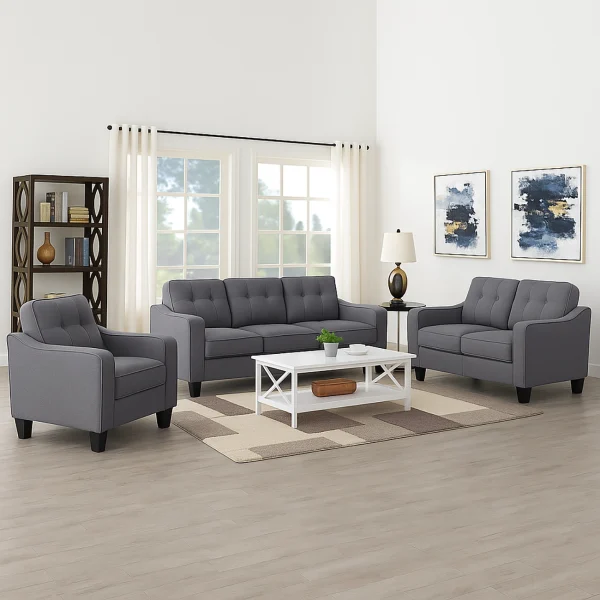 A modern three-piece living room set in dark gray. It includes a sofa, loveseat, and armchair, all with tufted backs.