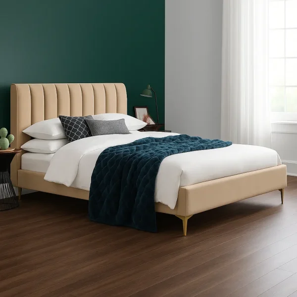 A light beige upholstered bed with a channel-tufted headboard, and a blue throw blanket.