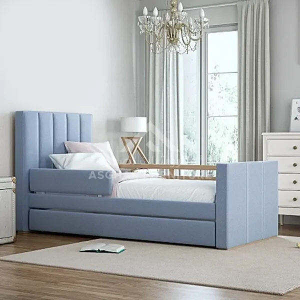 A pastel blue upholstered child's bed with a slatted headboard, side rails, and a pull-out trundle bed.