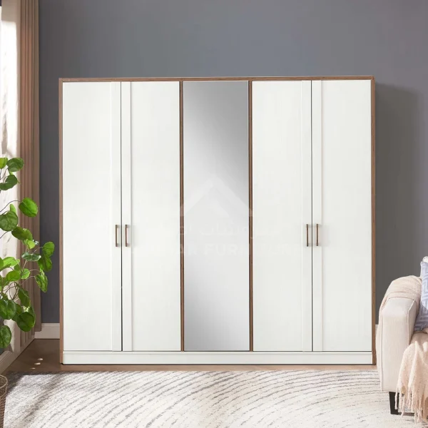A spacious white wardrobe with four doors, a central mirrored door, and dark wood accents.