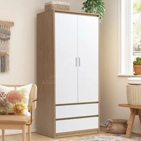 A light wood wardrobe with two white doors and two white bottom drawers, featuring silver handles.