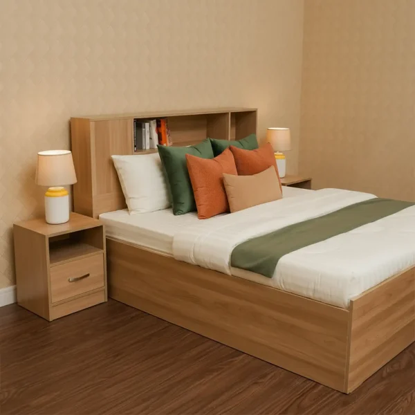 A light oak wood bed with an integrated bookshelf headboard and matching single-drawer nightstands.