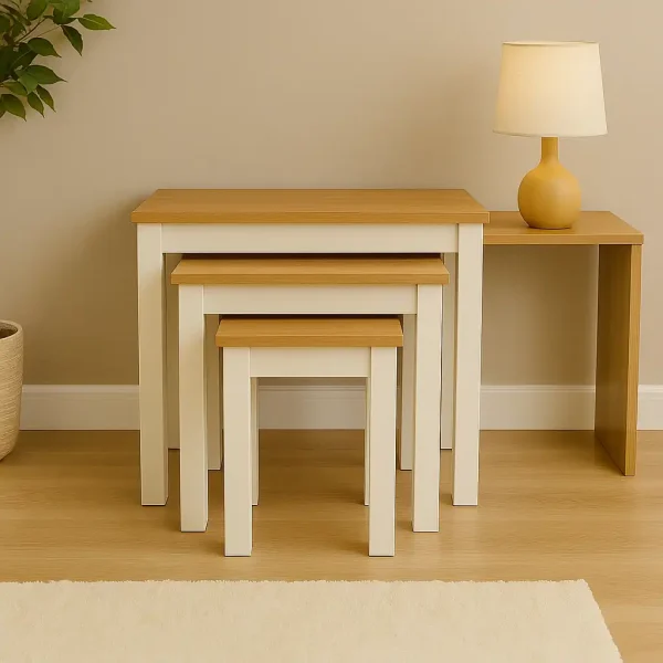 A nesting table set with white legs and natural wood tops sitting next to a wooden console table.