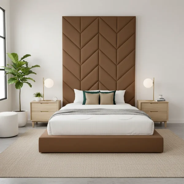A brown upholstered platform bed with a very tall, chevron-quilted headboard.