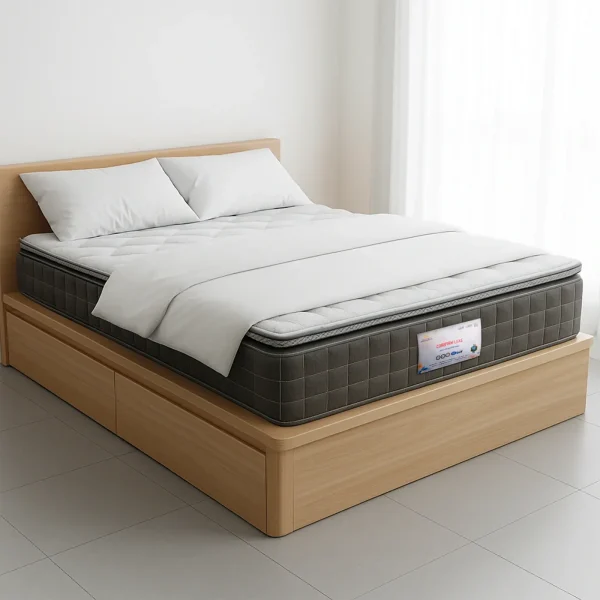 A two-tone mattress with a gray side panel and white top rests on a light wood platform bed with drawers.
