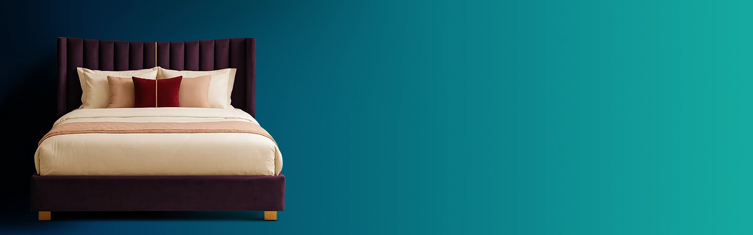 A plush, deep purple bed with a tall, ribbed headboard and pillows is shown against a teal background.